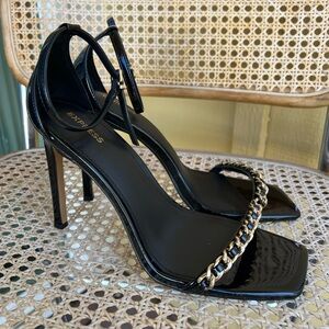 Express Black Heels with Gold Chain Detail